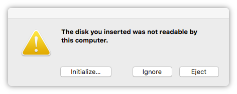 Экранный снимок сообщения Mac о нечитаемом диске
